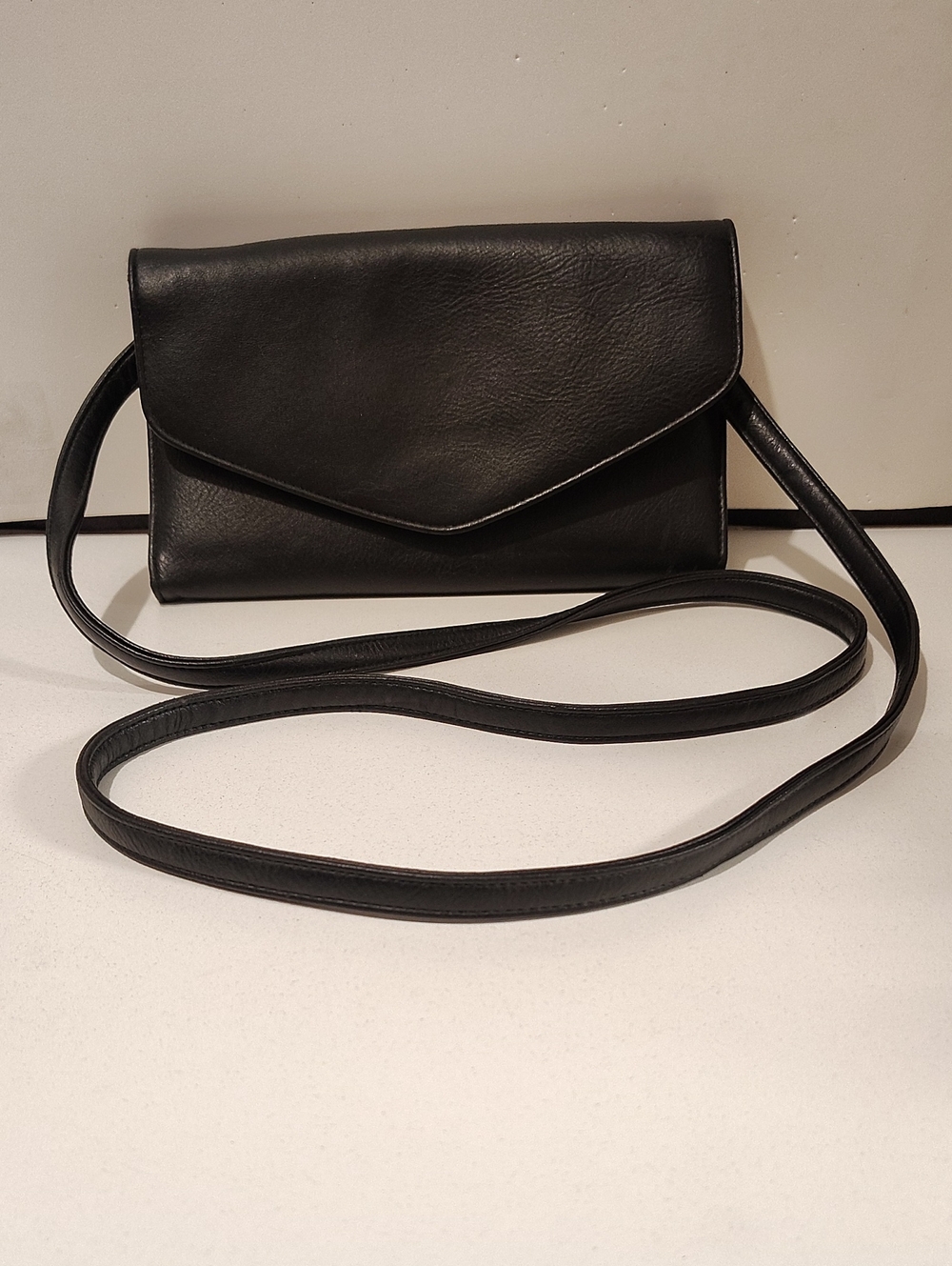 Jennifer Moore black leather envelope crossbody bag